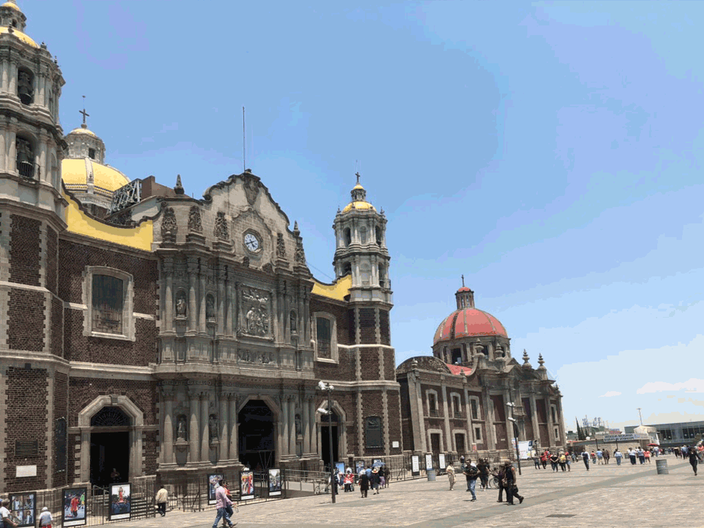 Historic churches and pilgrims around the Basilica of Guadalupe plaza in Mexico City